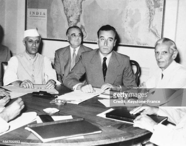During an historic conference in New Delhi, Lord MOUNTBATTEN and the main Indian leaders agree upon the partition of India according to a British...