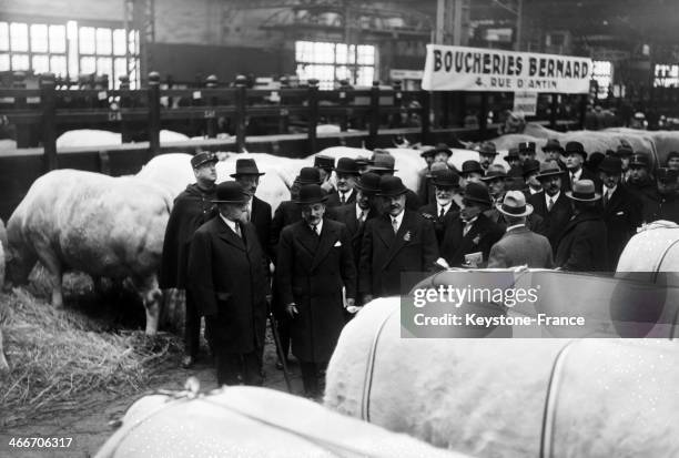 Circa 1930: Henri Queuille, Minister of Agriculture, visiting the agricultural show, circa 1930, in Paris, France.