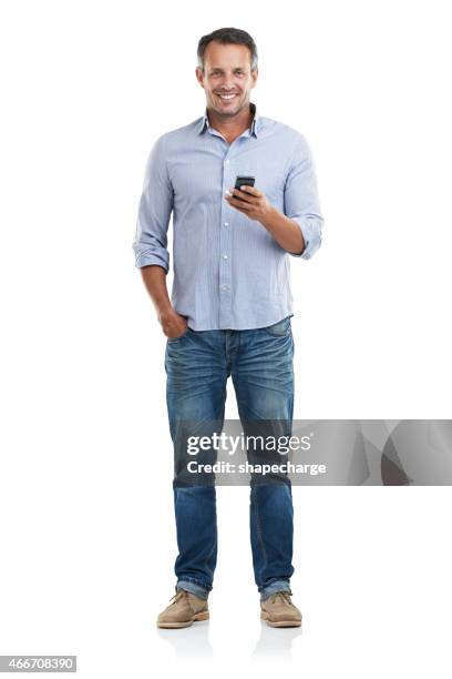 downloading a new app is so easy - man stand up front holding phone stock pictures, royalty-free photos & images