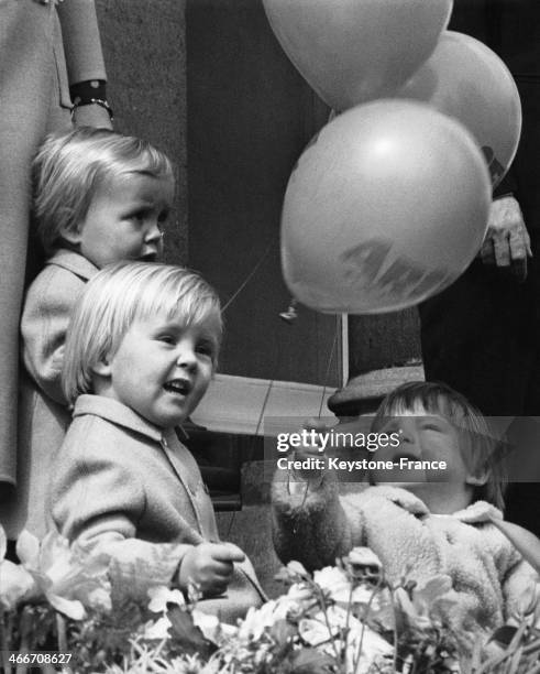 Sons of Princess Beatrix Princes Willem Alexander and Johan Friso and Prince Maurits, son of Princess Margriet, holding balloons at celebration of...