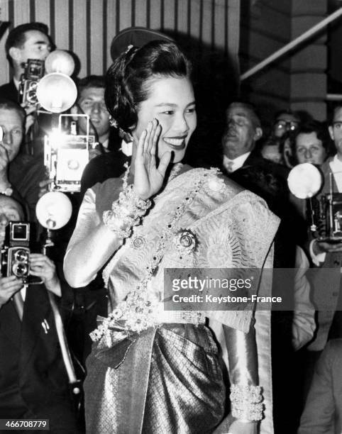 Queen Sirikit Kitiyakara Of Thailand waves at the crowd when arriving at the Thai embassy at Ashburn place in London, United Kingdom for a dinner...