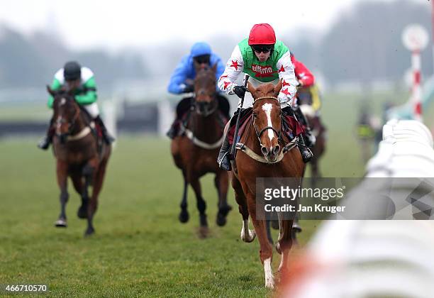 Board Of Trade ridden by Wayne Hutchinson wins the ApolloBet Follow on Twitter and Facebook Standard Open National Hunt Flat Race during Irish day at...