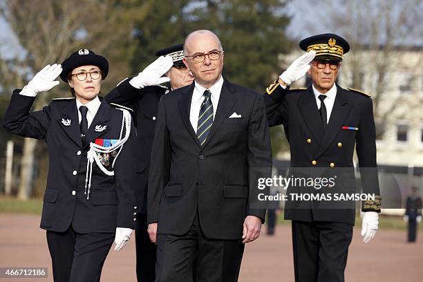 French Interior Minister Bernard Cazeneuve , Helene Martini , director of the Ecole Nationale Superieure des Officiers de Police and Seine-et-Marne...