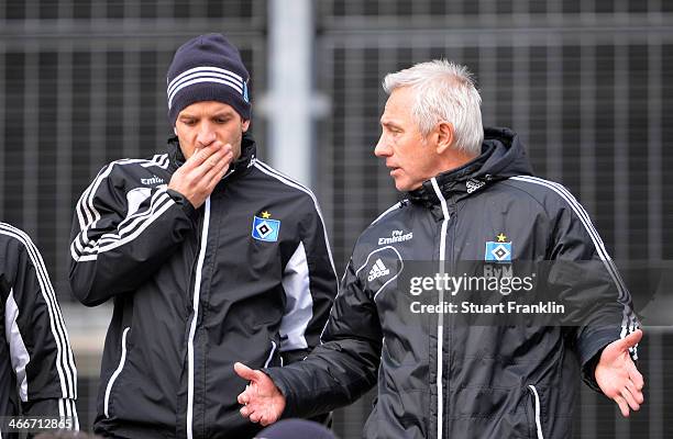 Team captain Rafael van der Vaart talks with Bert van Marwijk, head coach of Hamburg during the training session of Hamburger SV on February 3, 2014...