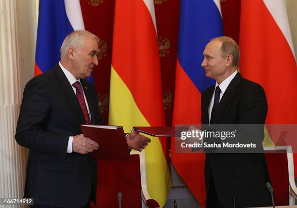 Russian President Vladimir Putin attends a meeting with President of South Ossetia Leonid Tibilov on March 18, 2015 in Moscow, Russia. A Lower House...