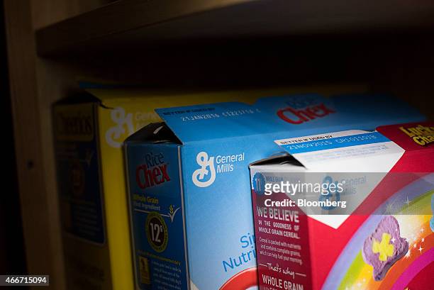 General Mills Inc. Breakfast cereal boxes are arranged for a photograph in Tiskilwa, Illinois, U.S., on Wednesday, March 18, 2015. General Mills...
