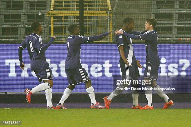 Aaron Leya Iseka of Anderlecht celebrates scoring the first goal of the game with team mates during the UEFA Youth League quarter final match between...