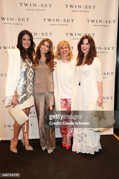 Bettina Zimmermann, Cathy Fischer, Simona Barbieri and Natalia Avelon pose during the TWIN-SET Simona Barbieri Flagship-Store Opening Event on March...