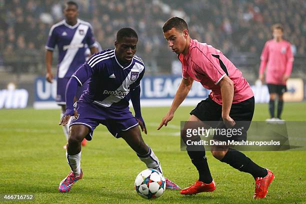 Franck Mikal of Anderlecht and Ruben Macedo of Porto battle for the ball during the UEFA Youth League quarter final match between RSC Anderlecht and...
