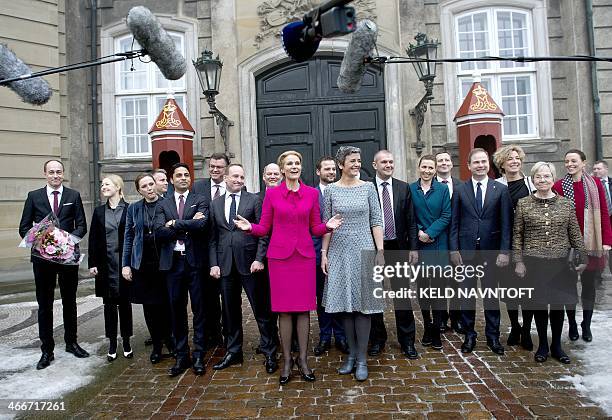 Danish Prime Minister Helle Thorning-Schmidt presents her new government at Amalienborg in Copenhagen on February 3, 2014: From left: Minister for...