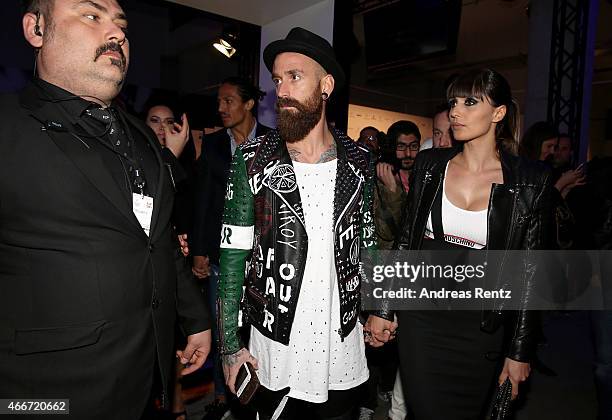 Footballer Raul Meireles and Ivone Meireles pose prior the Hakan Akkaya show during Mercedes Benz Fashion Week Istanbul FW15 on March 18, 2015 in...