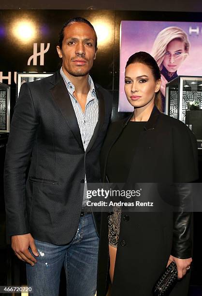 Footballer Bruno Alves and guest pose prior the Hakan Akkaya show during Mercedes Benz Fashion Week Istanbul FW15 on March 18, 2015 in Istanbul,...
