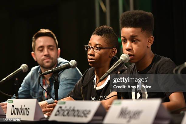 Nigel Smith, Managing Editor of Indiewire and musicians Alec Atkins and Jarad Dawkins of the band Unlocking the Truth speak onstage at 'Breaking A...