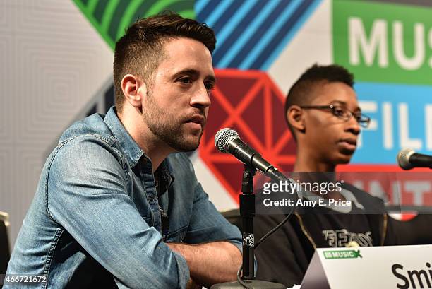 Nigel Smith, Managing Editor of Indiewire and and musician Alec Atkins of the band Unlocking the Truth speak onstage at 'Breaking A Monster:...