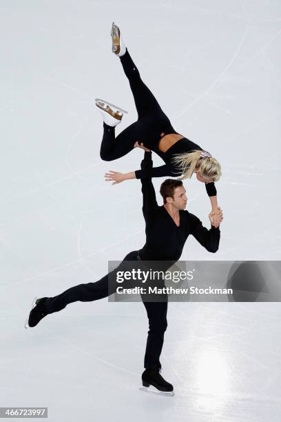 Dylan Moscovitch and Kirsten Moore Towers of Canada practice during Figure Skating Pairs training ahead of the Sochi 2014 Winter Olympics at Iceberg...