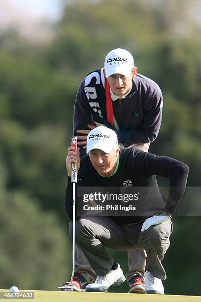 Andrew Murray of England and his son Tom in action during the first round of the European Senior Tour Qualifying School Finals played at Vale da...