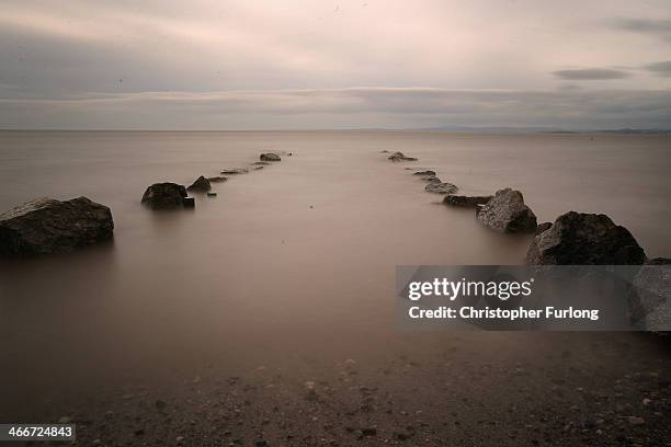 Rocks mark the pathway of cockle picker traffic at Morecambe Bay as locals prepare to commemorate the 10th anniversary of the 2004 Morecambe Cockle...