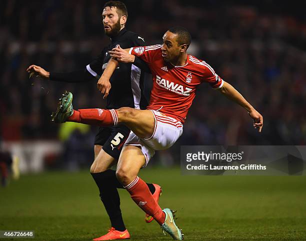 Dexter Blackstock of Nottingham Forest beats Kirk Broadfoot of Rotherham United to score their first goal during the Sky Bet Championship match...