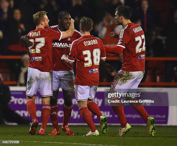 Michail Antonio of Nottingham Forest celebrates with team mates as he scores their second goal during the Sky Bet Championship match between...