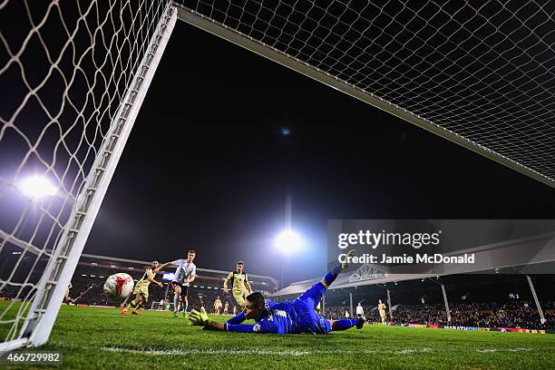 Marco Silvestri of Leeds United makes a save during the Sky Bet Championship match between Fulham and Leeds United at Craven Cottage on March 18,...