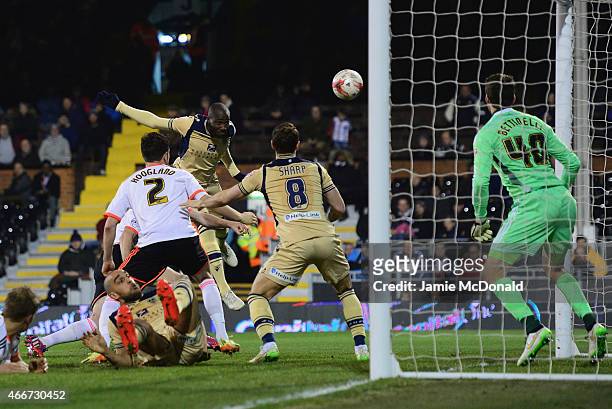 Souleymane Bamba of Leeds United scores their second goal past goalkeeper Marcus Bettinelli of Fulham during the Sky Bet Championship match between...