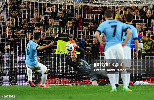 Sergio Aguero of Manchester City sees his penalty saved by Marc-Andre ter Stegen of Barcelona during the UEFA Champions League Round of 16 second leg...