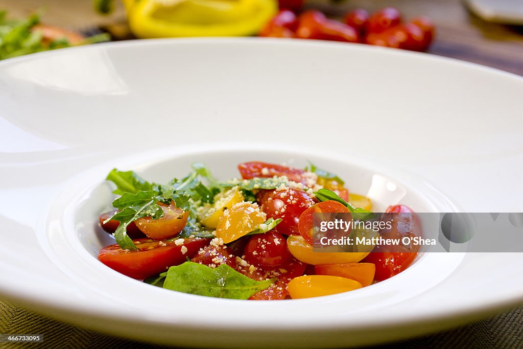 Cherry tomato salad with baby arugula