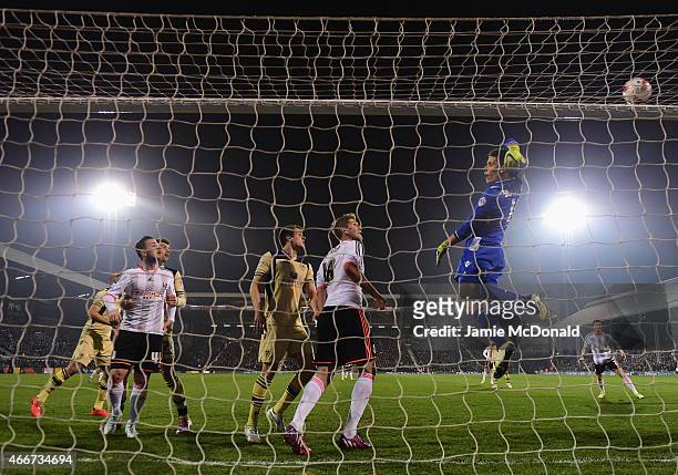 Marco Silvestri of Leeds United stretches for a cross during the Sky Bet Championship match between Fulham and Leeds United at Craven Cottage on...