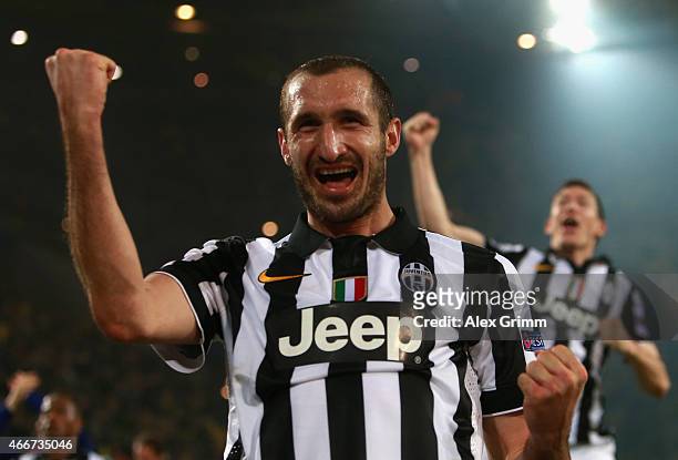 Giorgio Chiellini of Juventus celebrates victory after the UEFA Champions League Round of 16 between Borussia Dortmund and Juventus at Signal Iduna...