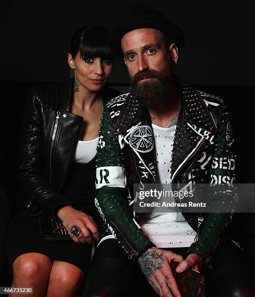 Raul Meireles and guest attend the Hakan Akkaya show during Mercedes Benz Fashion Week Istanbul FW15 on March 18, 2015 in Istanbul, Turkey.