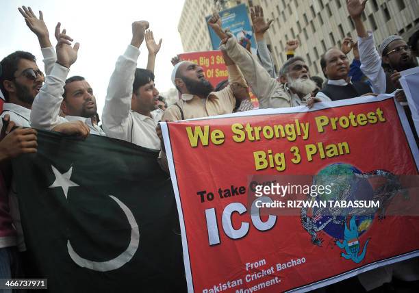 Pakistani cricket fans shout slogans during a protest against the International Cricket Council and its decision to restructure and hand power to...