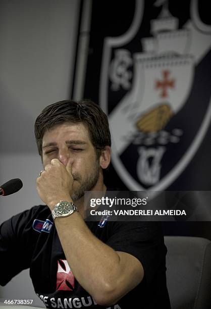 Brazilian former footballer Juninho Pernambucano, who retired last week, cries during press conference at the Sao Januario stadium in Rio de Janeiro,...