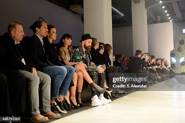 Footballer Bruno Alves, guest, Ivone Meireles and footballer Raul Meireles pose at the Hakan Akkaya show during Mercedes Benz Fashion Week Istanbul...