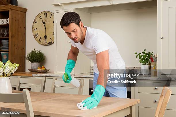 male cleaning the kitchen - men housework stock pictures, royalty-free photos & images