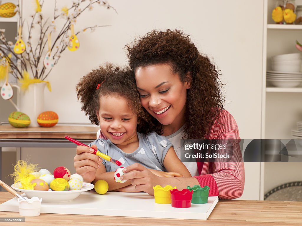 Mother and Daughter Painting Easter Eggs