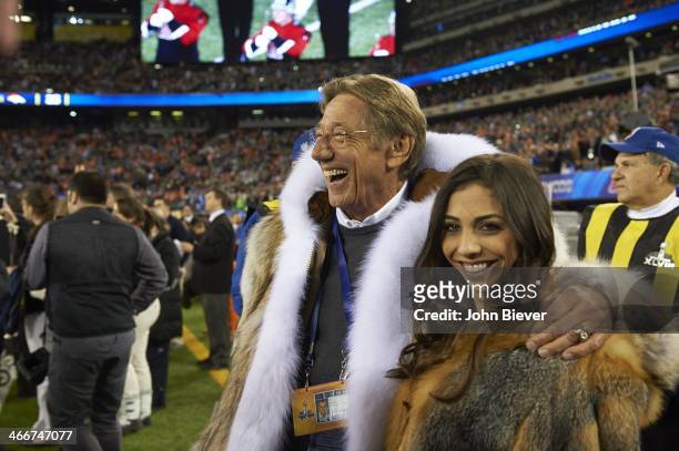 Super Bowl XLVIII: View of former New York Jets QB Joe Namath with his daughter, Jessica Namath, on field before Seattle Seahawks vs Denver Broncos...