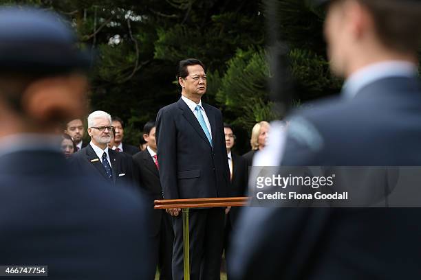 Vietnamese Prime Minister Nguyen Tan Dun inspects the guard of honour at Government House on March 19, 2015 in Auckland, New Zealand. The Vietnamese...