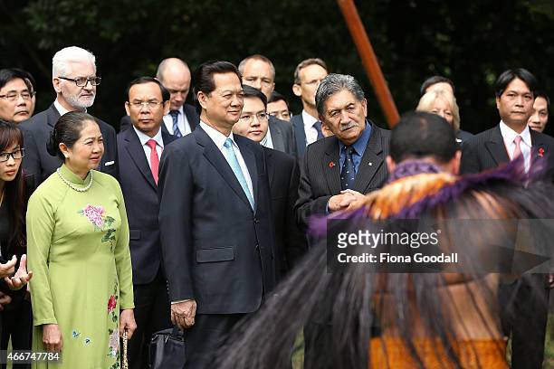 Vietnamese Prime Minister Nguyen Tan Dun and his wife Tran Thanh Kiem watch a traditional Maori welcome at Government House on March 19, 2015 in...