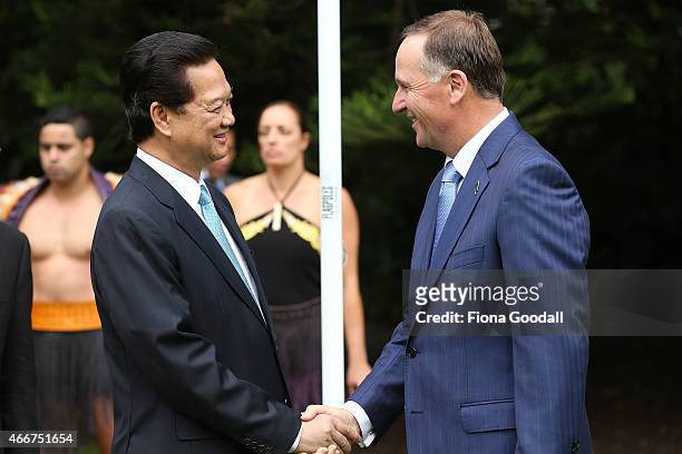 Vietnamese Prime Minister Nguyen Tan Dun meets New Zealand Prime Minister John Key at Government House on March 19, 2015 in Auckland, New Zealand....