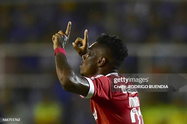 Brazilian Internacional's Vitinho celebrates his goal against Emelec from Ecuador during their Copa Libertadores football match at Jocay stadium in...