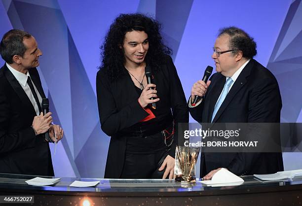 French classical musician Nemanja Radulovic speaks after receiving an award for 'Instrumental solo musician of the year' from the hands of French...