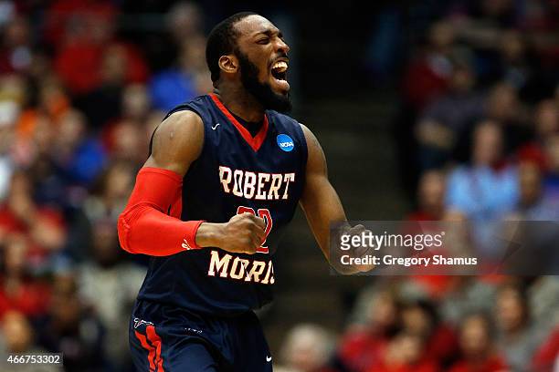 Lucky Jones of the Robert Morris Colonials celebrates against the North Florida Ospreys during the first round of the 2015 NCAA Men's Basketball...
