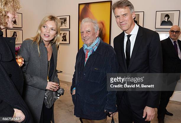 Kate Moss, David Bailey and Claus-Dietrich Lahrs attend a private view of Bailey's Stardust, a exhibition of images by David Bailey supported by Hugo...
