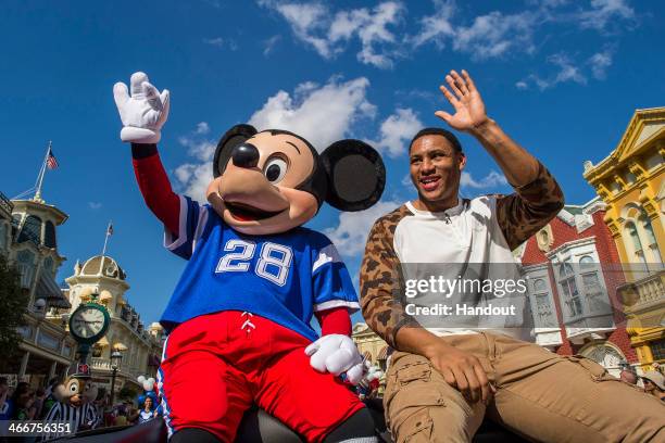 In this handout photo provided by Disney Parks, Super Bowl XLVII MVP Malcolm Smith of the Seattle Seahawks participates in his parade at the Magic...