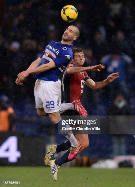 Lorenzo De Silvestri of UC Sampdoria and Paolo De Ceglie of Genoa CFC compete for the ball during the Serie A match between Genoa CFC and UC...