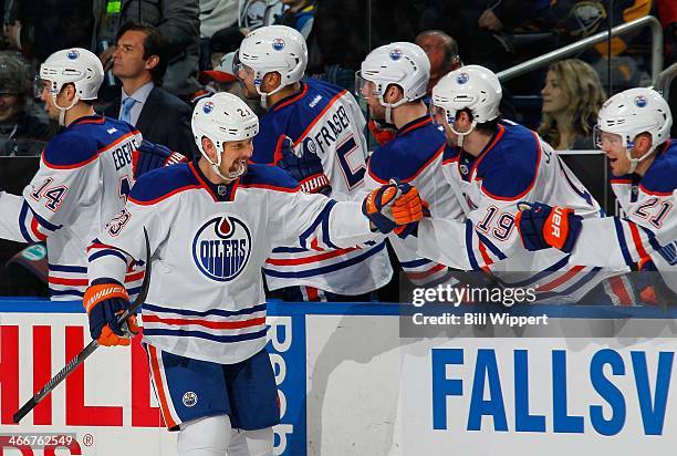 Matt Hendricks of the Edmonton Oilers celebrates his game-winning goal against the Buffalo Sabres on February 3, 2014 at the First Niagara Center in...