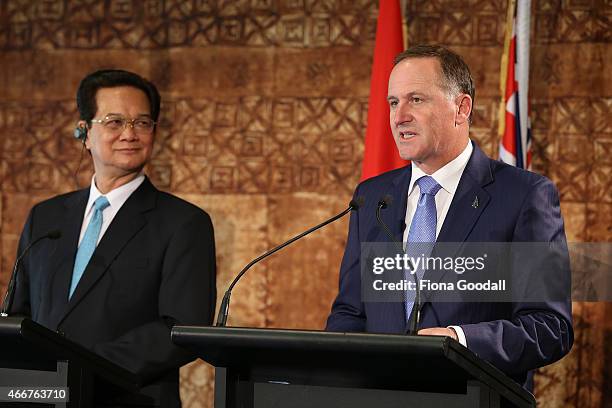 Vietnamese Prime Minister Nguyen Tan Dun and New Zealand Prime Minister John Key speak to the media at Government House on March 19, 2015 in...