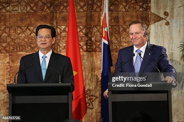 Vietnamese Prime Minister Nguyen Tan Dun and New Zealand Prime Minister John Key speak to the media at Government House on March 19, 2015 in...