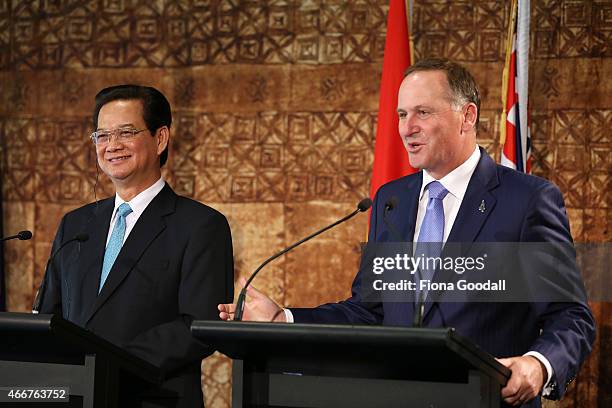 Vietnamese Prime Minister Nguyen Tan Dun and New Zealand Prime Minister John Key speak to the media at Government House on March 19, 2015 in...