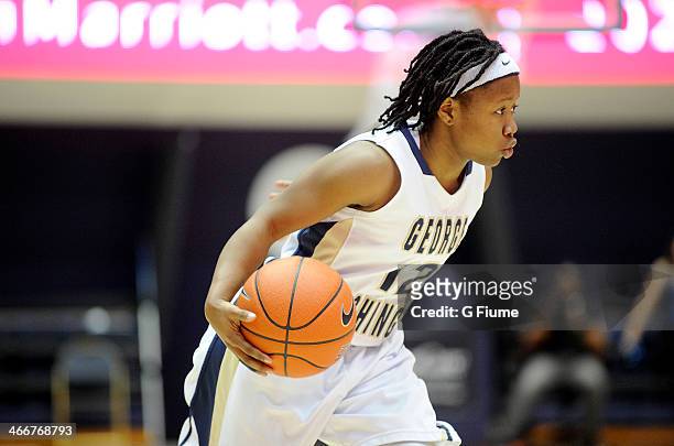 Danni Jackson of the George Washington Colonials handles the ball against the Saint Joseph's Hawks on January 22, 2014 at the Smith Center in...